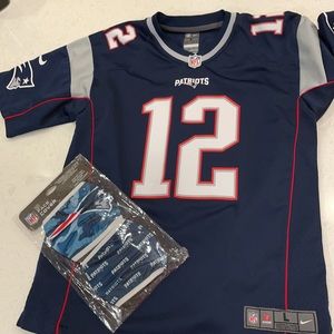 NFL youth patriots jersey. Tom Bradys jersey and two NWT patriots masks